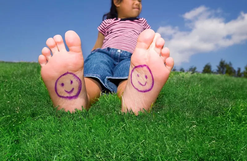 Happy Feet on Green Grass