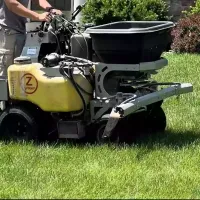 man-on-machine-fertilizing.